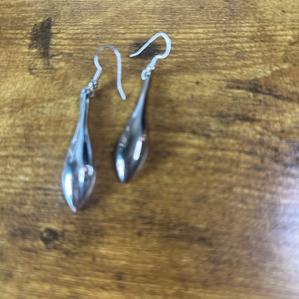 Trendy long silvertone earring